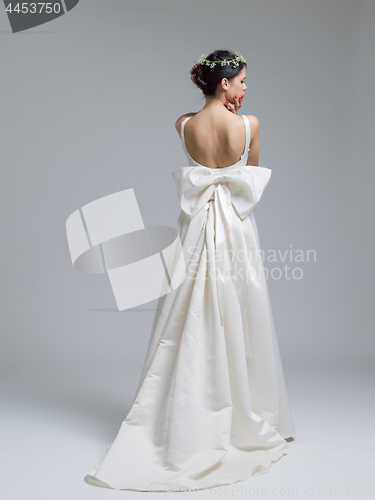 Image of Portrait of beautiful young women in wedding dress