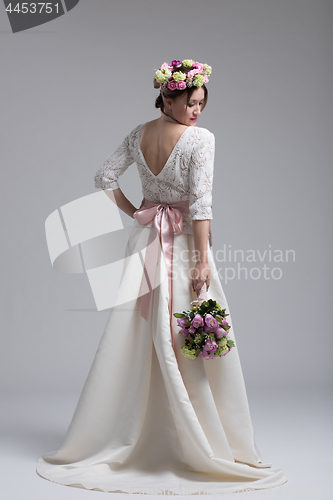 Image of bride with a bouquet  isolated on white background