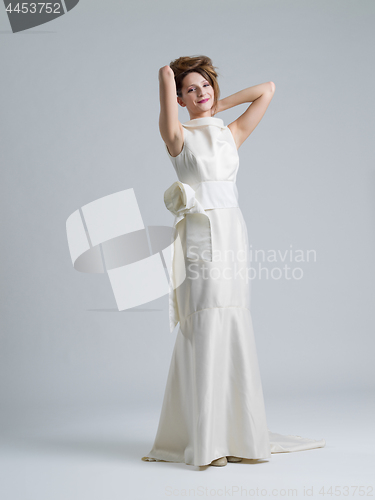 Image of Portrait of beautiful young women in wedding dress