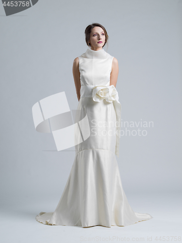 Image of Portrait of beautiful young women in wedding dress