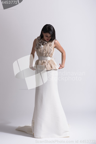 Image of Portrait of beautiful young women in wedding dress