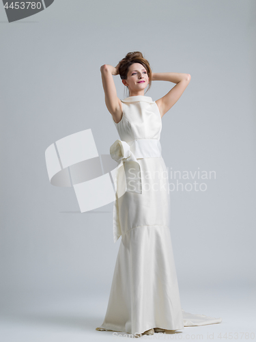 Image of Portrait of beautiful young women in wedding dress