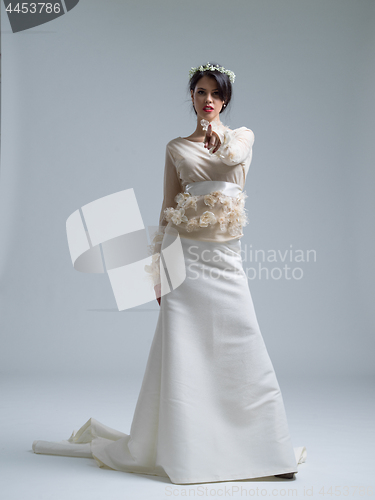 Image of Portrait of beautiful young women in wedding dress