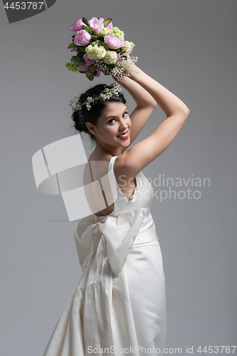 Image of bride with a bouquet  isolated on white background