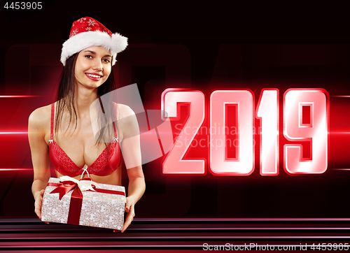 Image of Santa girl with present in 2019