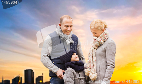 Image of happy family over sunset in tallinn city