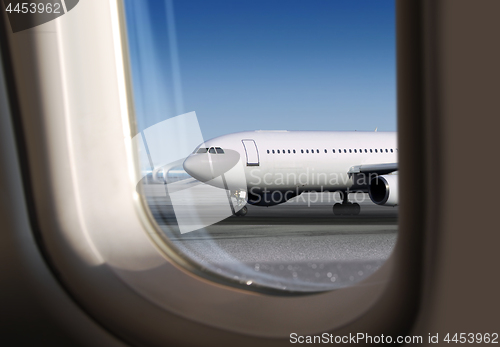 Image of view of plane through window