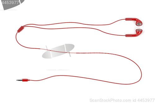 Image of Red wired earphones on white background