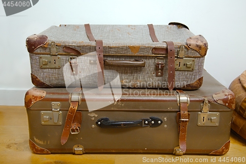 Image of Vintage suitcases on the floor