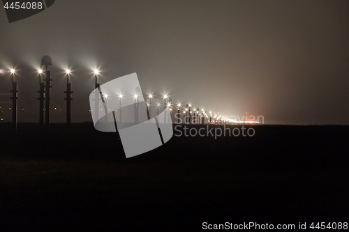 Image of Runway lights at night