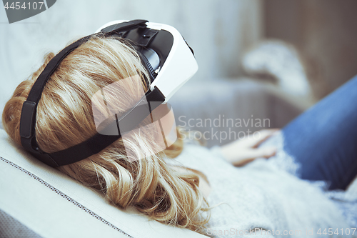 Image of Woman wearing Virtual reality headset