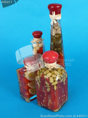 Image of Vinegar Bottles on Blue