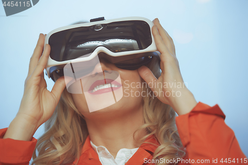 Image of Woman wearing Virtual reality headset