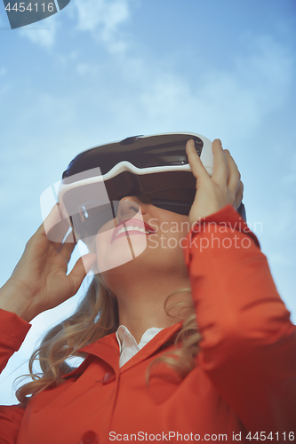 Image of Woman wearing Virtual reality headset