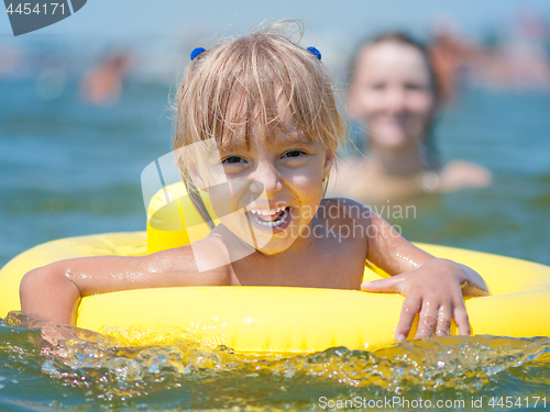 Image of Little girl in sea 