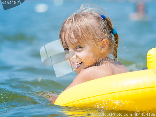 Image of Little girl in sea 