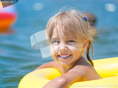 Image of Little girl in sea 