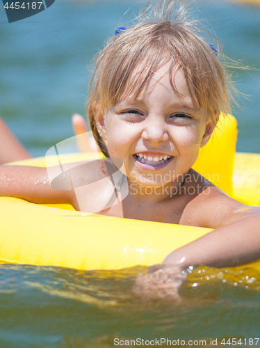 Image of Little girl in sea 