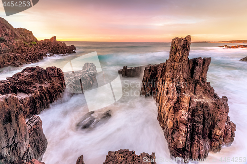 Image of Sea stack views and ocean flows amazing sunrise