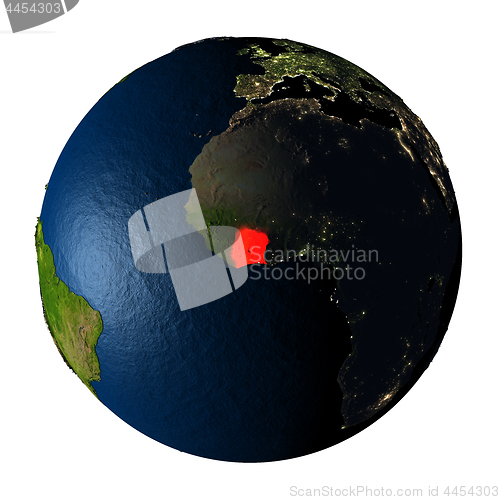 Image of Ivory Coast in red on Earth isolated on white