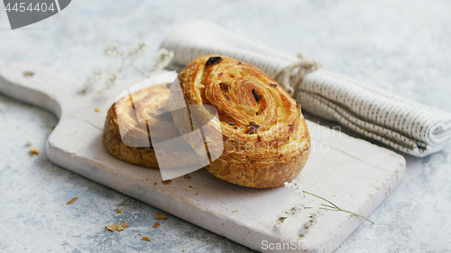 Image of Served baked buns on white board