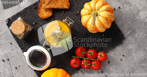 Image of Pumpkin soup with vegetables on napkin