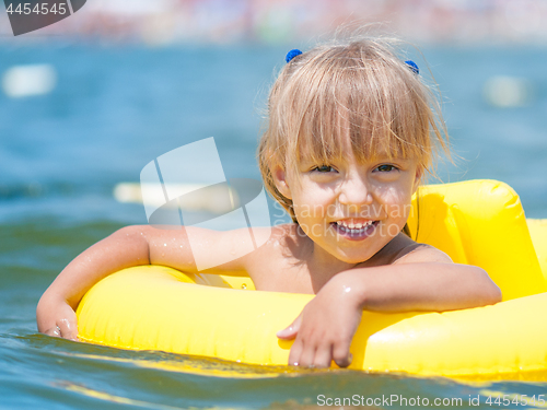 Image of Little girl in sea 