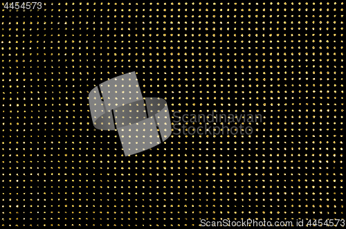 Image of Black fabric with golden metallic dots