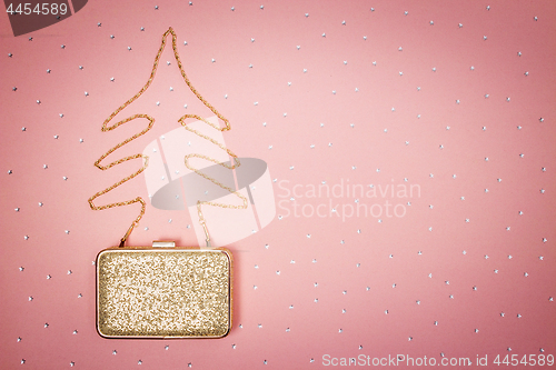 Image of Christmas tree made of a golden purse chain