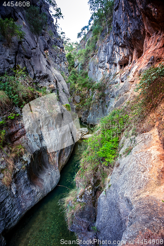 Image of Canyon filled with crystal clear water