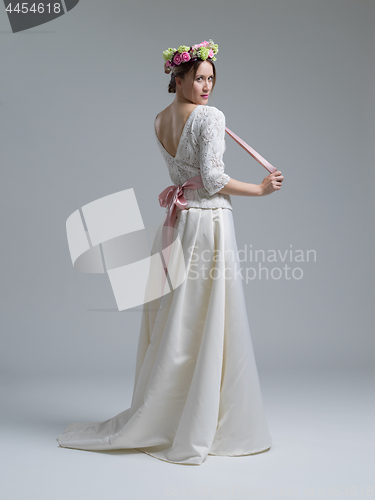 Image of Portrait of beautiful young women in wedding dress