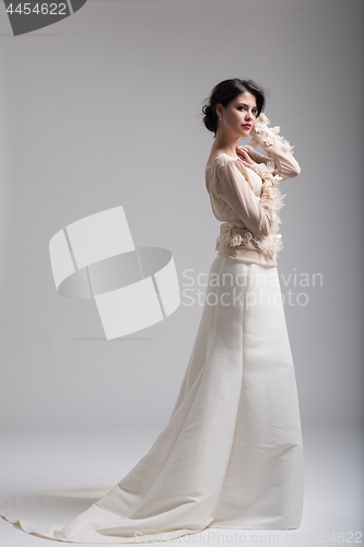 Image of Portrait of beautiful young women in wedding dress