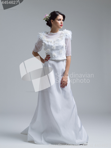 Image of Portrait of beautiful young women in wedding dress