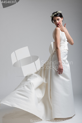 Image of Portrait of beautiful young women in wedding dress