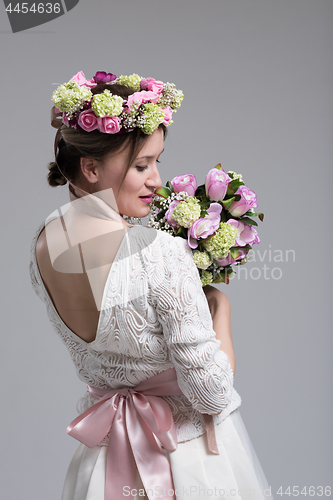 Image of bride with a bouquet  isolated on white background