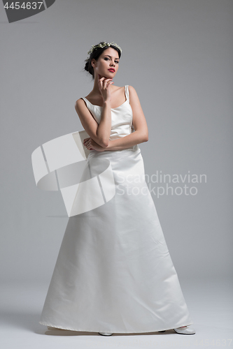 Image of Portrait of beautiful young women in wedding dress