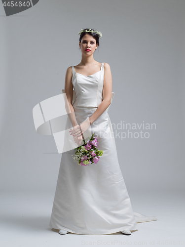 Image of bride with a bouquet  isolated on white background