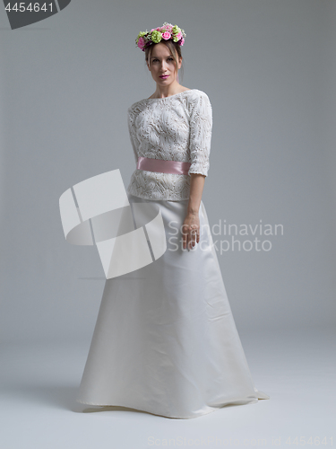 Image of Portrait of beautiful young women in wedding dress