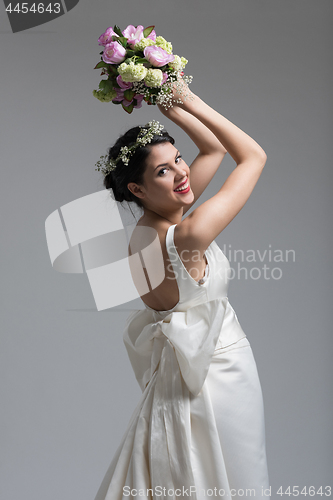 Image of bride with a bouquet  isolated on white background