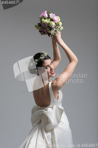 Image of bride with a bouquet  isolated on white background