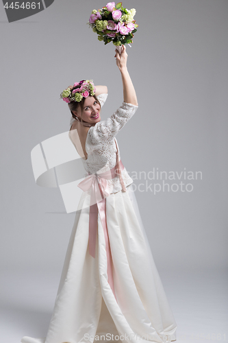 Image of bride with a bouquet  isolated on white background