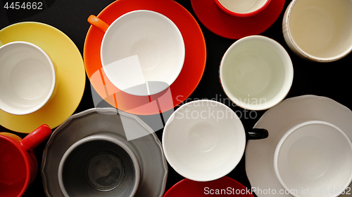 Image of Empty colorful modern ceramic plates and cups collection