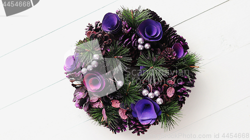 Image of Christmas Wreath on White Wooden Background