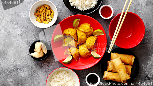 Image of Chinese food set on stone table