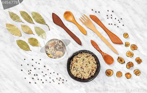 Image of Styled food ingredients and utensils on marble background