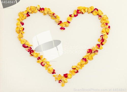 Image of Heart made of yellow and red rose petals