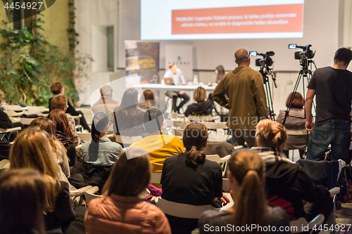 Image of Media interview and round table discussion at popular scientific conference.