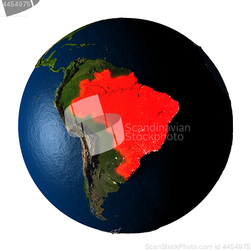 Image of Brazil in red on Earth isolated on white