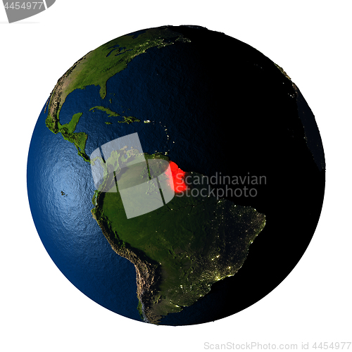 Image of Guyana in red on Earth isolated on white