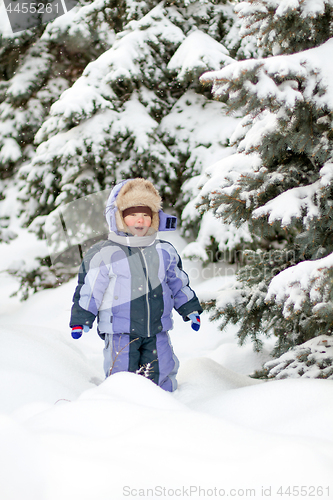 Image of Boy enjoying the first snow